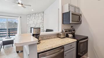 Fridge, microwave, dishwasher, coffee/tea maker