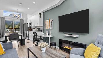 TV, fireplace, books, offices