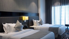 Kahden hengen huone (yksi tai kaksi sänkyä), 2 yhden hengen sänkyä | 1 makuuhuone, tallelokero huoneessa, pimennysverhot, äänieristys