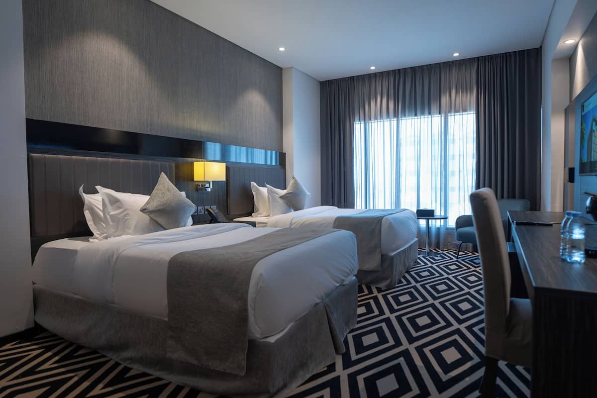 Double or Twin Room, 2 Twin Beds | 1 bedroom, in-room safe, blackout drapes, soundproofing