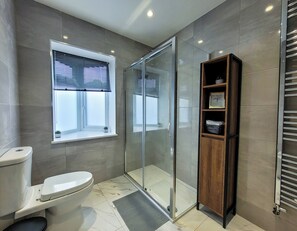 Hair dryer, bidet, towels, soap