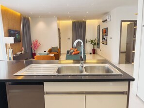 Interior - Spacious 1-bedroom home with WiFi, AC, Games, Patio & More (Ashaley Botwe,)