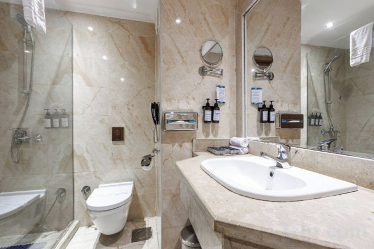 Bathroom | Shower, free toiletries, hair dryer, bathrobes