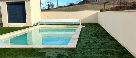 Piscine extérieure, piscine chauffée