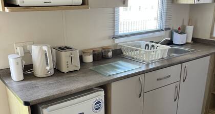 Modern static caravan available at popular Seton Sands Holiday Village.