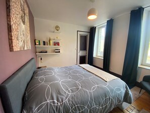 1 bedroom, desk, iron/ironing board, travel crib