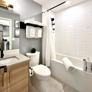 Hair dryer, towels, soap, shampoo