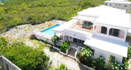 Perfect 4-bedroom house with AC in soothing Anguilla getaway