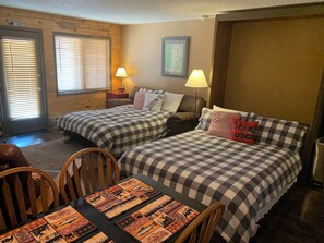 1 bedroom, desk, iron/ironing board, travel crib