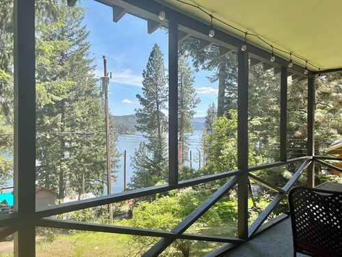 Charming 2-bedroom cabin with lake views offering a quiet, lake-side retreat.