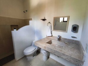 Shower, towels, soap, toilet paper