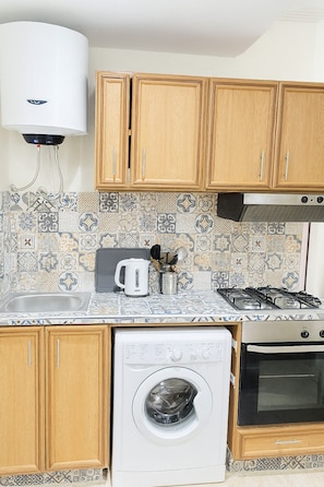 Premium Apartment, 3 Bedrooms, Balcony | Private kitchen | Full-sized fridge, microwave, stovetop, espresso maker
