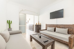 Premium Apartment, 3 Bedrooms | Living area | 55-cm Smart TV with satellite channels, Netflix, streaming services