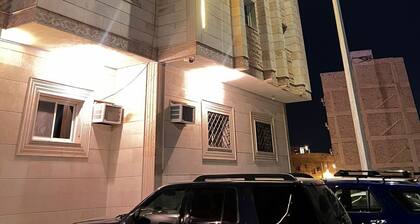 Spacious building with 56 bedrooms and AC, WiFi in fabulous Madinah