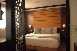 Junior Suite, River View | Minibar, in-room safe, desk, laptop workspace - Nile Bride (Cairo)