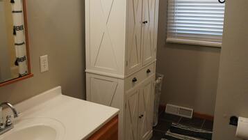 Shower, towels, soap, toilet paper