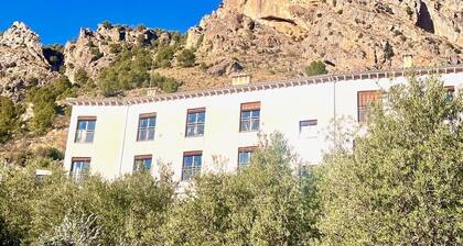Hidden farmhouse with mountains where nature unfolds its greatest splendor.