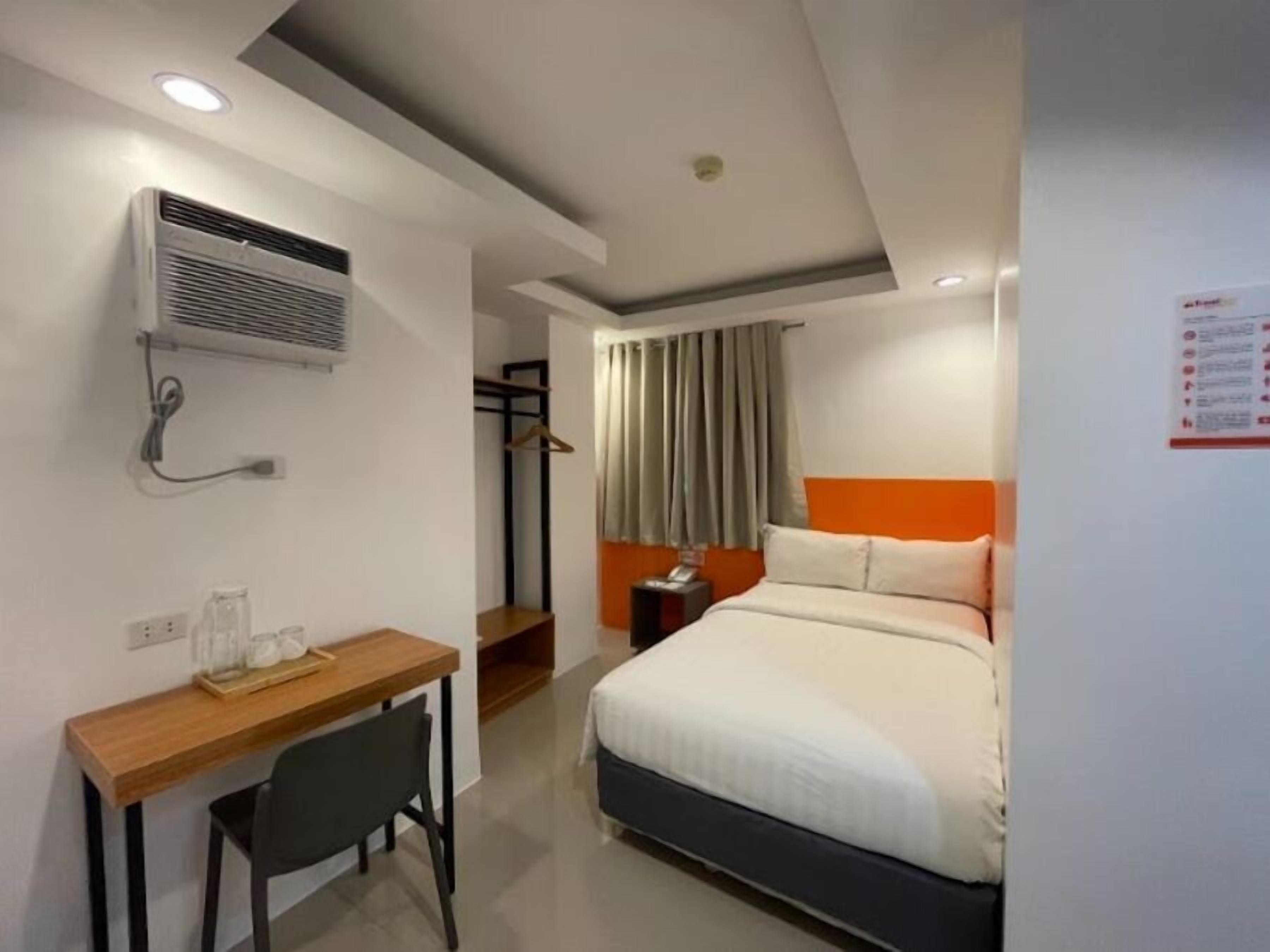 Quarto solteiro standard | Escrivaninha, Wi-Fi de cortesia, roupa de cama