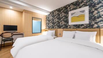 Deluxe Twin Room, City View | 1 bedroom, down comforters, desk, laptop workspace