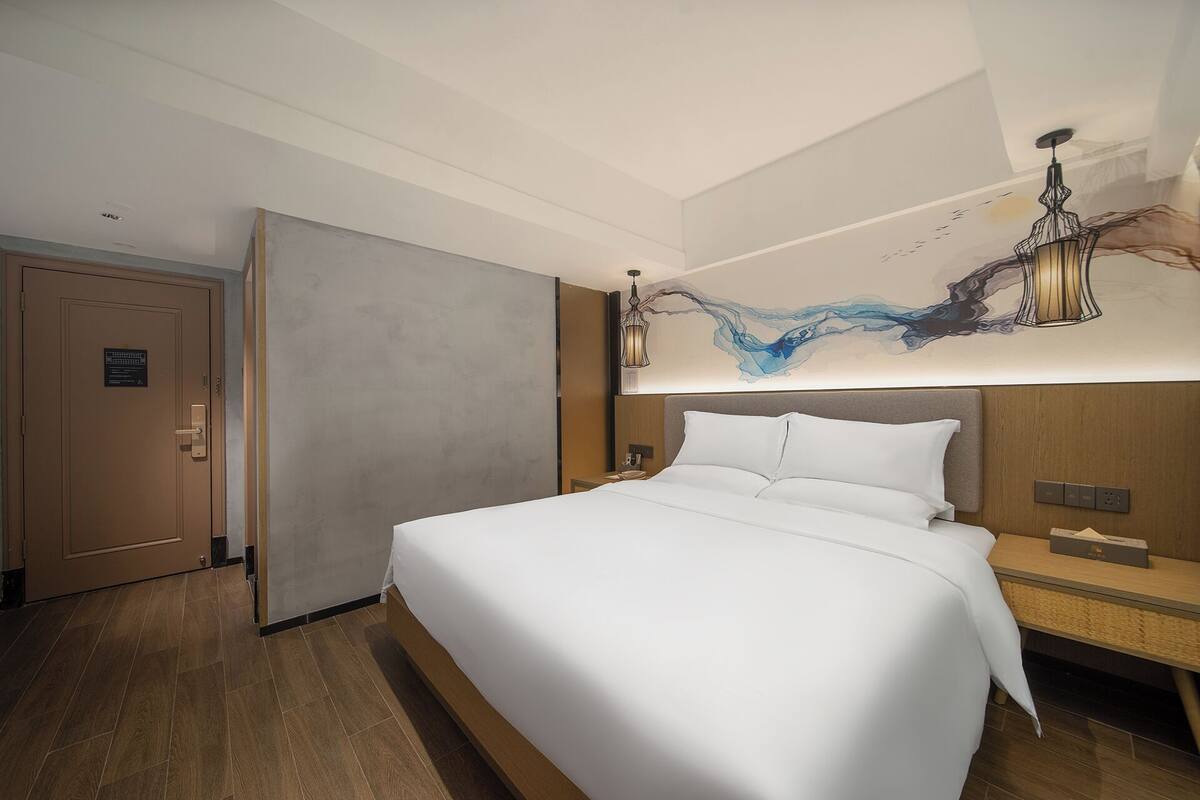 1 bedroom, laptop workspace, blackout curtains, soundproofing