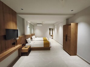 Habitació triple Deluxe | Llençols de cotó egipci i roba de llit d'alta qualitat