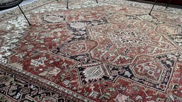 A room with a large window, a patterned rug, and two black chairs. - Family country house for 11 people (Bulson)