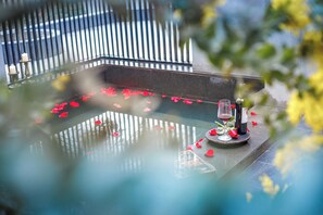 Luxury Double Room, Courtyard View | Bathroom | Hair dryer, slippers, towels, soap
