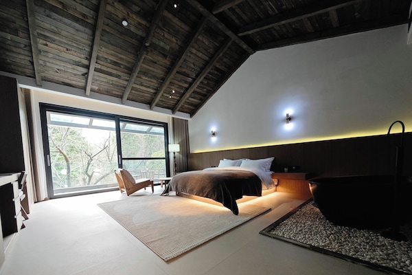 Deluxe tweepersoonskamer, balkon, uitzicht op tuin | Uitzicht op de tuin