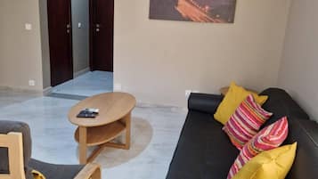 Appartement, 1 chambre, accessible aux personnes à mobilité réduite, patio | Salle de séjour