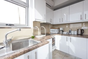 Fridge, microwave, oven, dishwasher