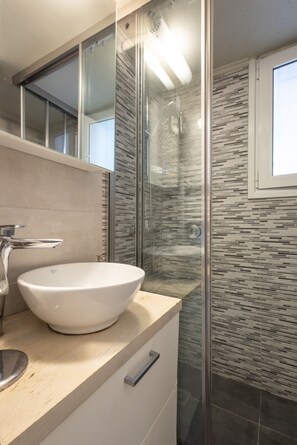 Shower, hair dryer, soap, shampoo