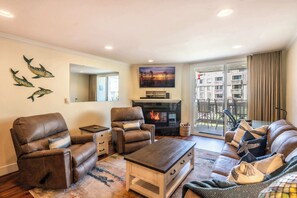 TV, fireplace, books, offices