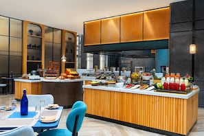 Daily buffet breakfast (INR 1003 per person)