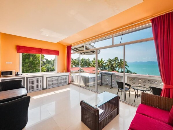 Studio, Balcony, Sea View | Living area | 50-cm TV with digital channels, books, pay movies - Lemon House apartment (Koh Samui)