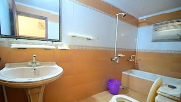 Standard Room | Bathroom | Bathrobes, slippers, towels, soap