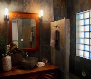 Shower, hair dryer, towels, soap
