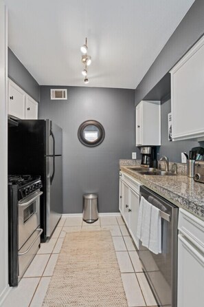 Fridge, microwave, stovetop, coffee/tea maker