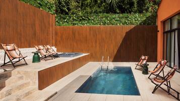 Seasonal outdoor pool, pool loungers