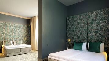 Blackout curtains, soundproofing, free WiFi, bed sheets