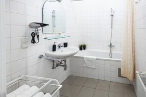 Hair dryer, towels, soap, shampoo