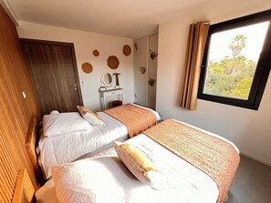 2 bedrooms, in-room safe, iron/ironing board, travel crib