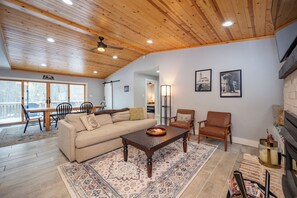 Smart TV, fireplace, foosball, books