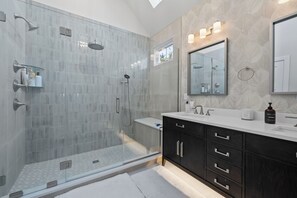 Shower, towels, soap, toilet paper
