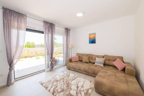 Villa (Four Bedroom Villa with Pool) | Living room | 32-inch flat-screen TV with cable channels