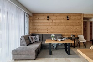 Comfort Apartment, Mountain View | Living room | Flat-screen TV - Hyrny Giewont LoftAffair (Koscielisko)
