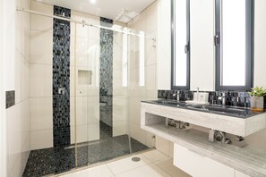 Shower, hair dryer, towels, toilet paper