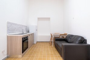 Appartement, vue partielle sur la mer | Cuisine privée