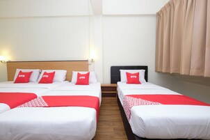 Desk, laptop workspace, bed sheets