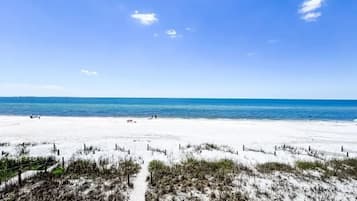 On the beach, sun loungers