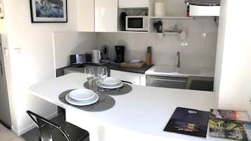 Fridge, microwave, coffee/tea maker, toaster